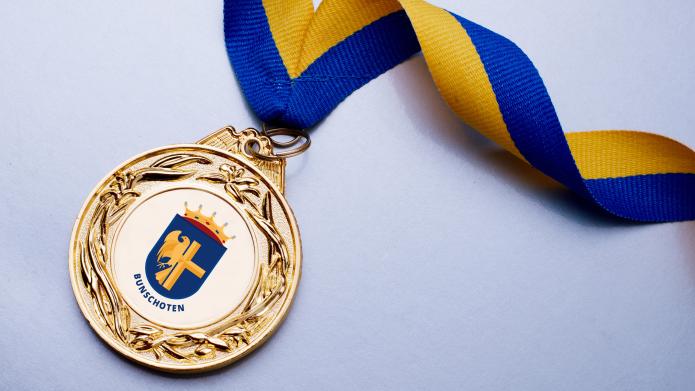 Medaille met logo gemeente Bunschoten